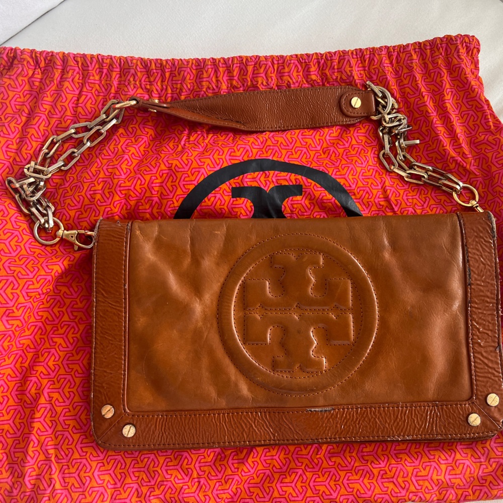 Tory Burch flap clutch. Tan brown leather